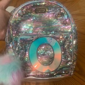 Mini Justice bag with the letter “O”